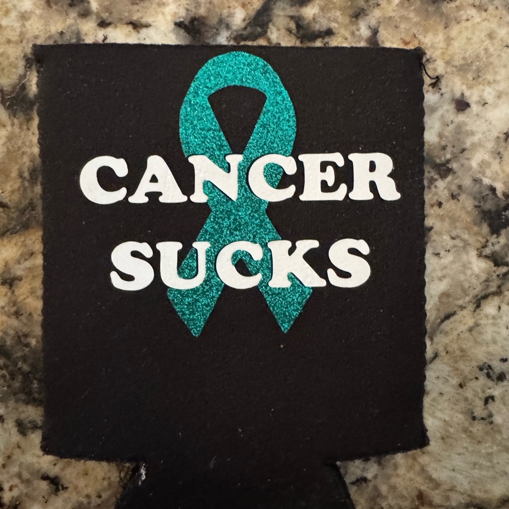 Cancer sucks coozies.
